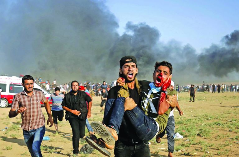إصابة طفل فلسطيني ووالده برصاص الاحتلال الإسرائيلي في رام الله 1 1020508