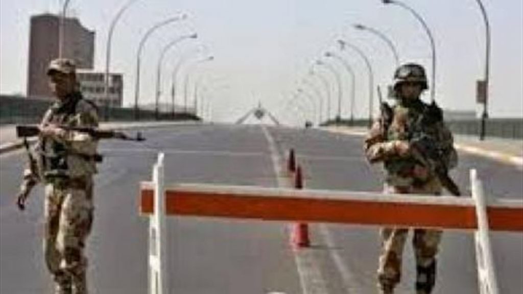 القوات العراقية تغلق جسر الجمهورية بسبب تظاهرات حاشدة تندد بحرق المصحف في الدنمارك 1 NB 141169 6357340621467406391690003382