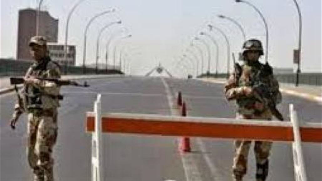 القوات العراقية تغلق جسر الجمهورية بسبب تظاهرات حاشدة تندد بحرق المصحف في الدنمارك 1 NB 141169 6357340621467406391690003382