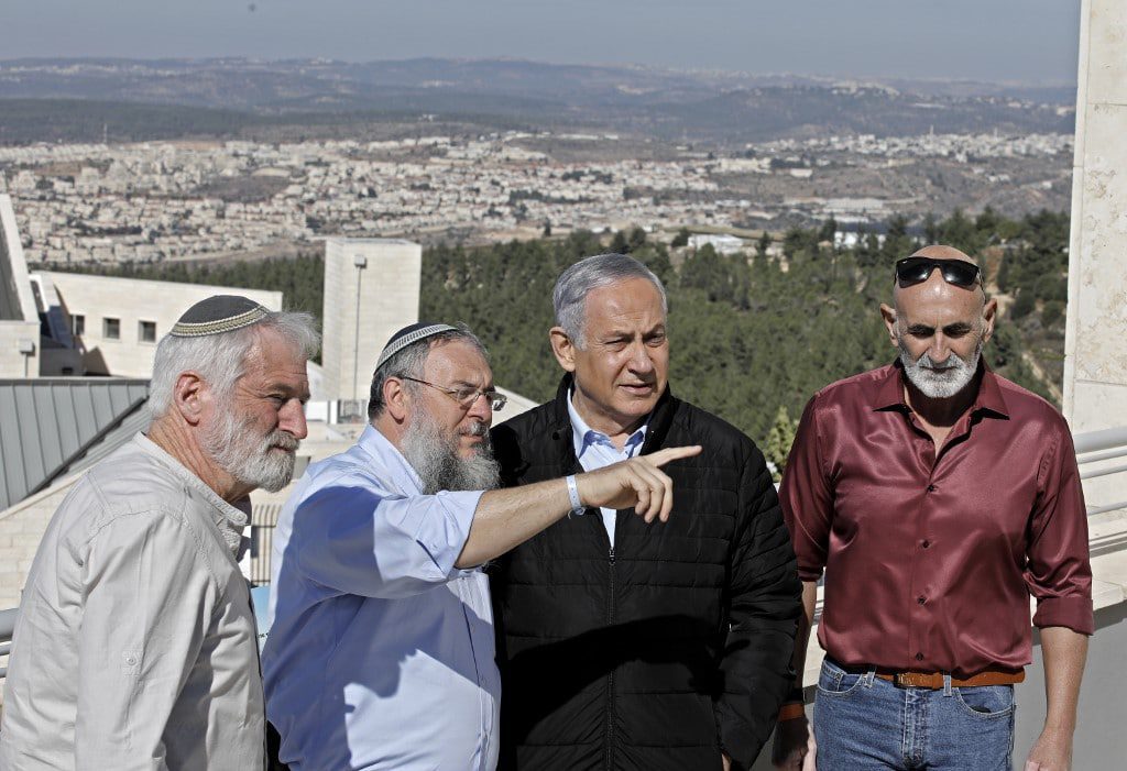 منظمة دولية : الفيتو الأمريكي بمثابة إعطاء ضوء أخضر للاحتلال الإسرائيلي 1 Translation Israeli settlement fanack AFP Menahem