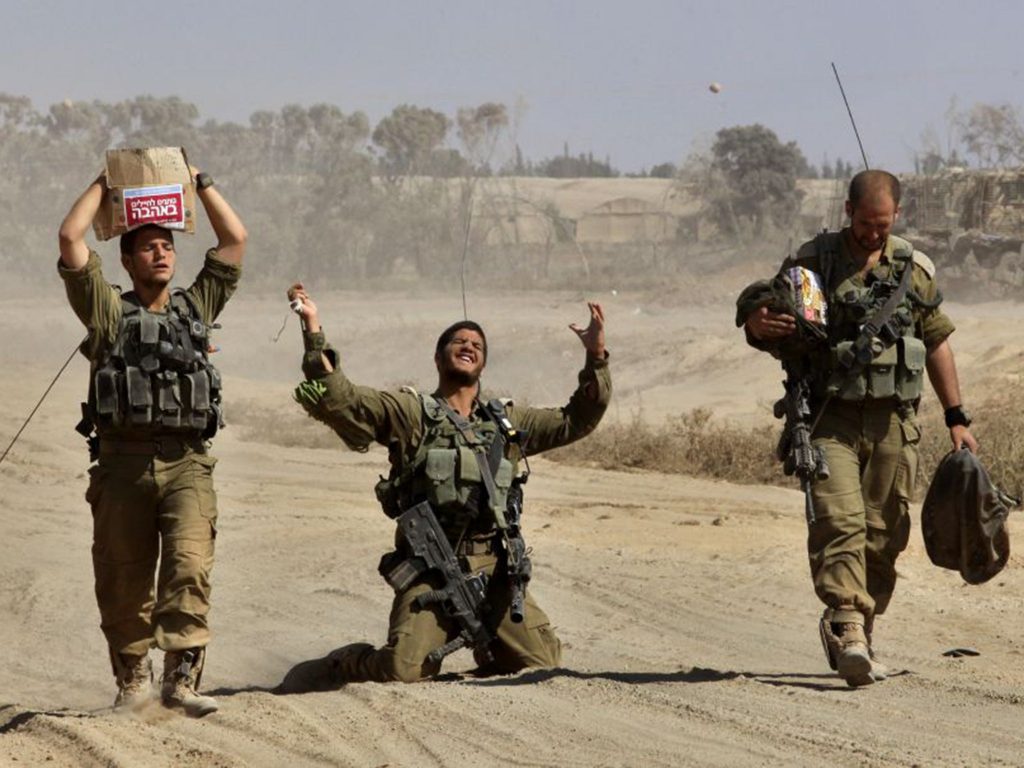 واشنطن بوست: هجوم إسرائيل على قوافل المساعدات يثير مخاوف بشأن نهجها في حرب غزة 1 23 Israeli Soldier AFPGet1725087664