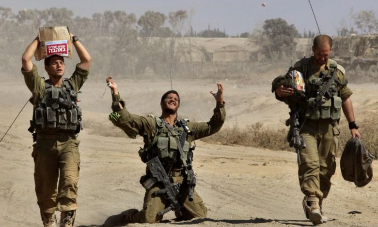 واشنطن بوست: هجوم إسرائيل على قوافل المساعدات يثير مخاوف بشأن نهجها في حرب غزة 1 23 Israeli Soldier AFPGet1725087664